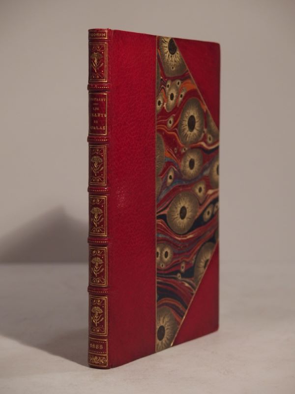 Couverture du livre Estimation du livre « les oeillets de Kerlaz. Edition originale illustré de quatre eaux-fortes de Rudaux et de huit en-têtes et culs-de-lampe de Giacomelli gravées par T. de Mare. »